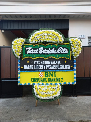 Papan Bunga Duka di Loa Buah